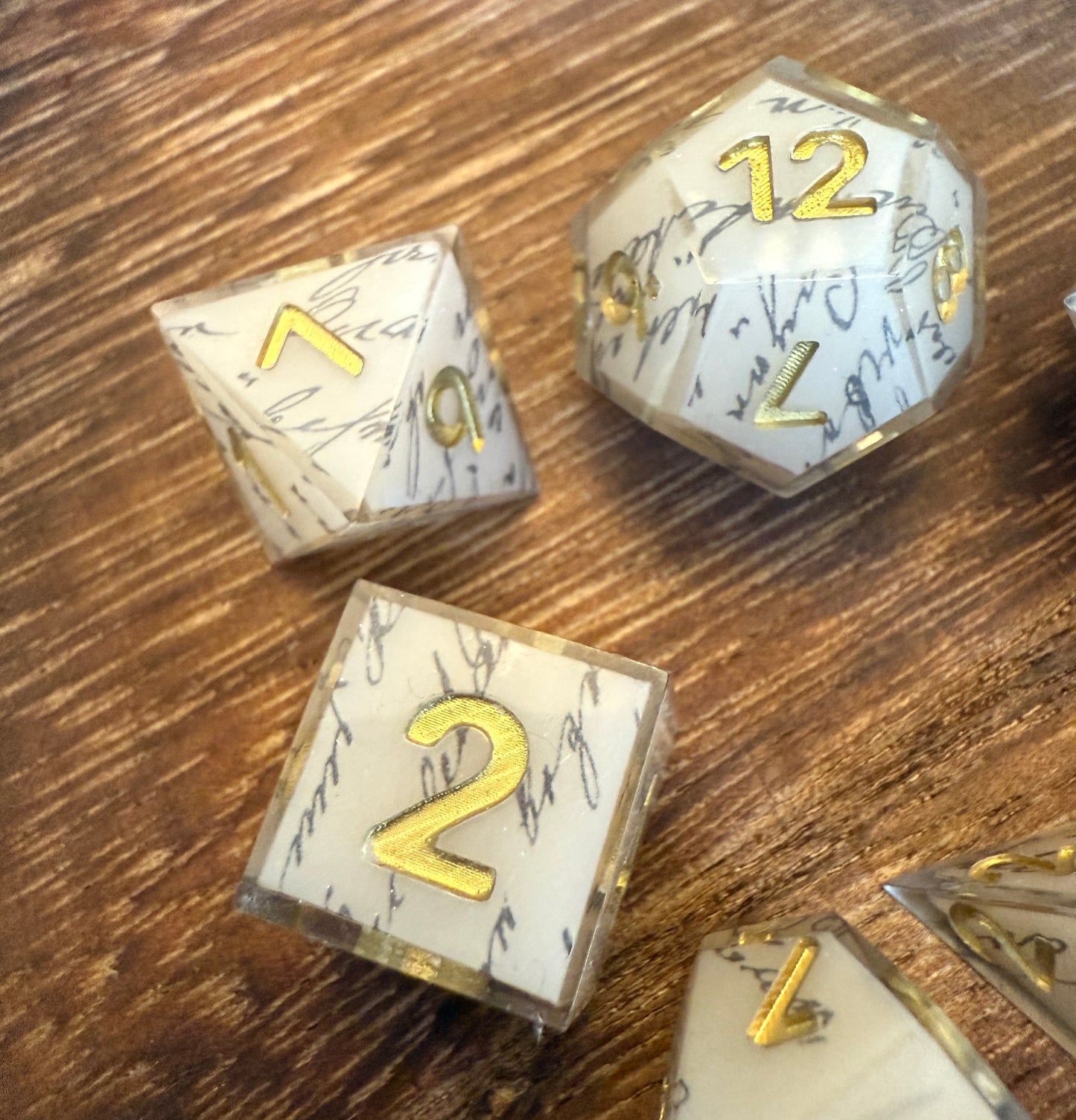 Script on parchment, sharp edged shell dice, hand poured resin for D&D, Pathfinder and other RPG‘s